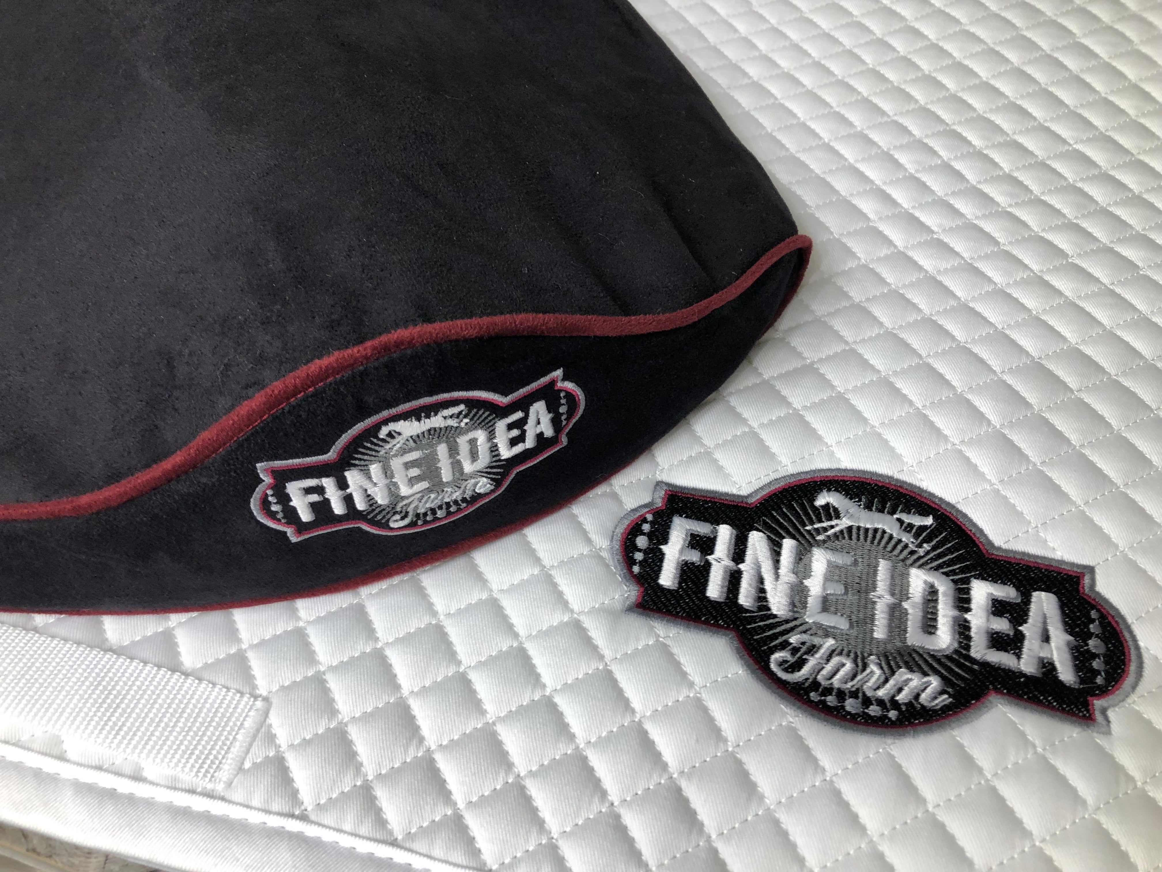 SaddleMattress TM Supreme OWN logo with matching white saddle pad